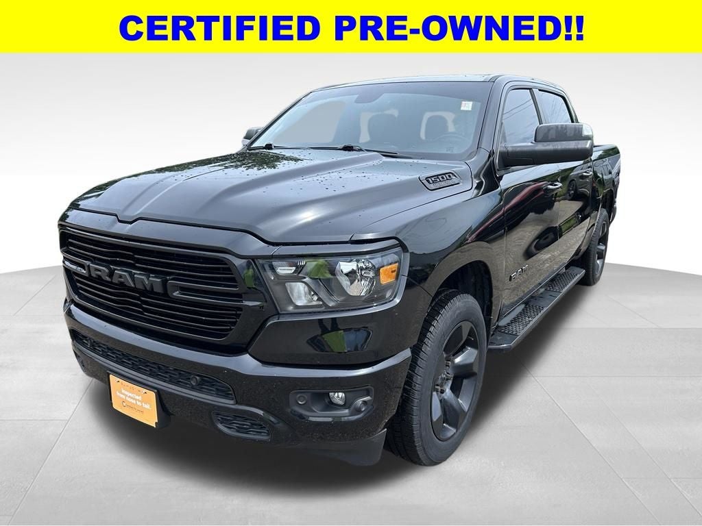 2019 RAM 1500 Big Horn/Lone Star Crew Cab 4x4 5'7' Box in Diamond Black Crystal Pearlcoat — front three-quarter view