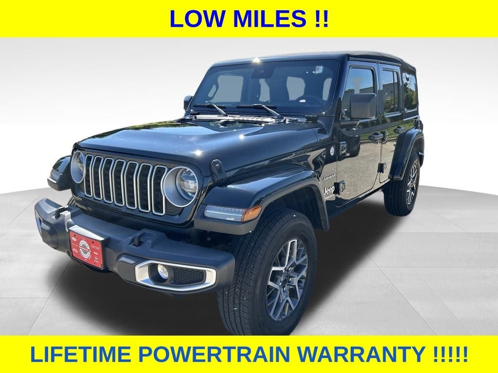 2024 Jeep Wrangler Sahara in Black Clearcoat — front three-quarter view