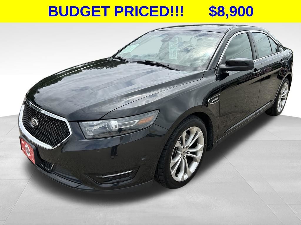 2013 Ford Taurus SHO in Tuxedo Black Metallic — front three-quarter view