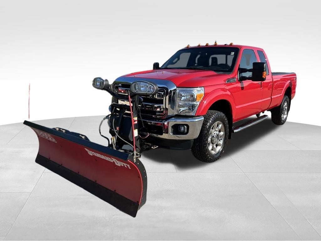 2014 Ford F-250SD Lariat in Vermillion Red — front three-quarter view